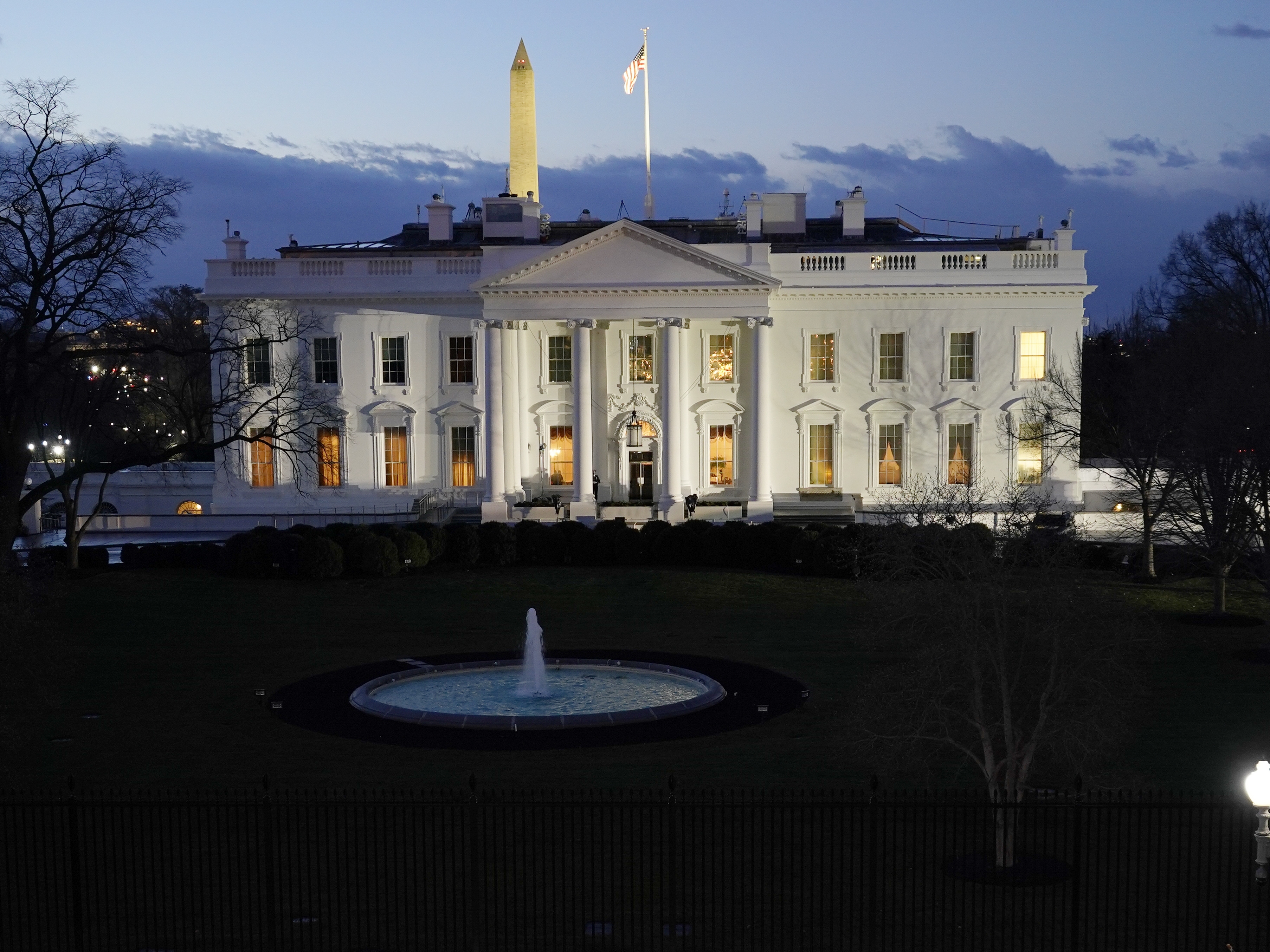 caption: The White House is seen in the early morning before Inauguration Day ceremonies on Jan. 20, 2021.