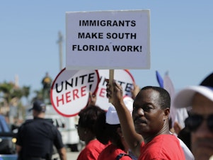caption: Florida lawmakers say SB 1718, a new anti-immigration law set to take effect on July 1, was written to scare migrants from moving to the state. Now, they're trying to convince people to stay.