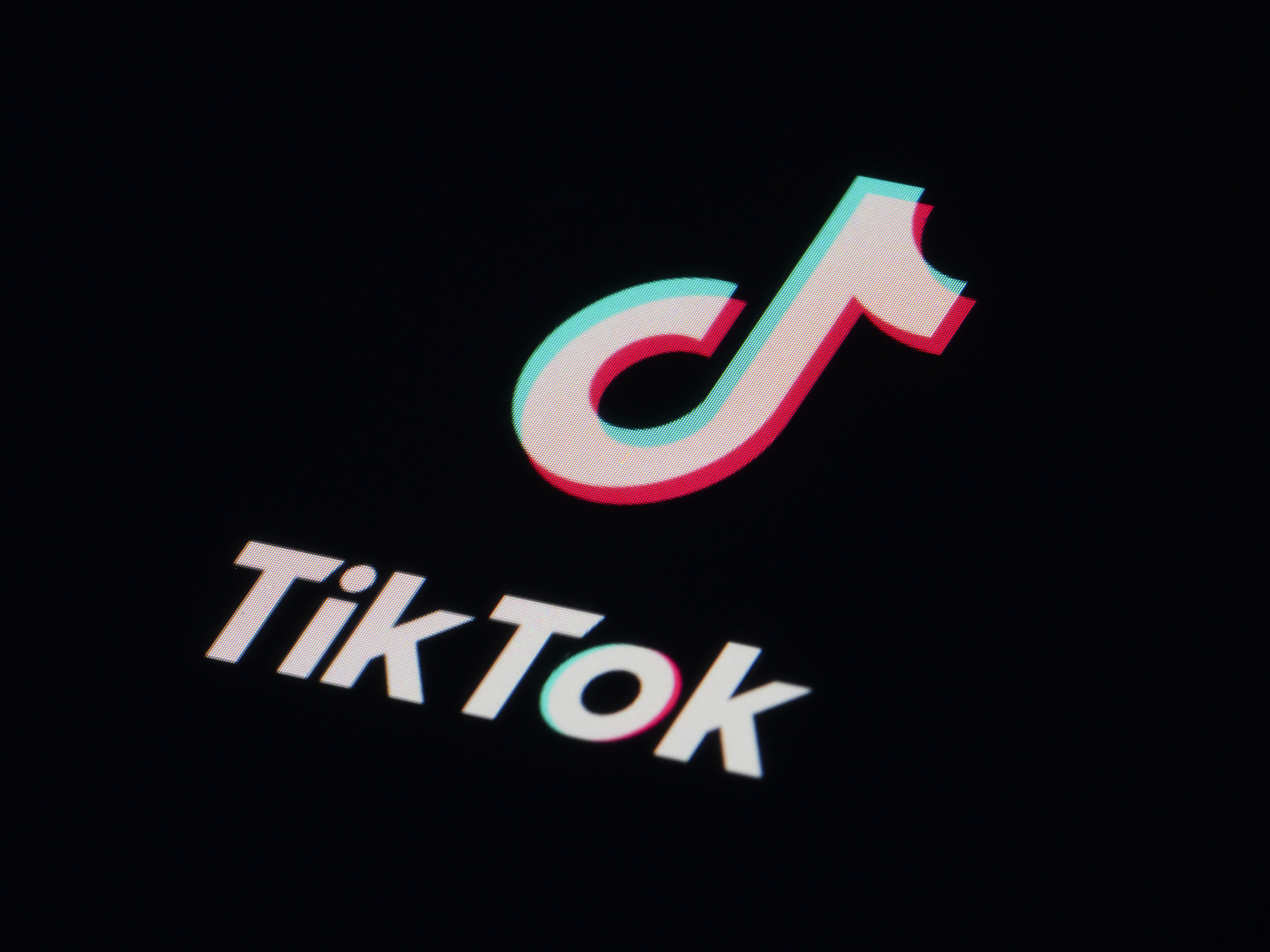 caption: TikTok asked a panel of federal appeal judges on Monday to overturn a law that would ban the app in the U.S. by January unless it fully divests from its Beijing-based parent company. ByteDance. 