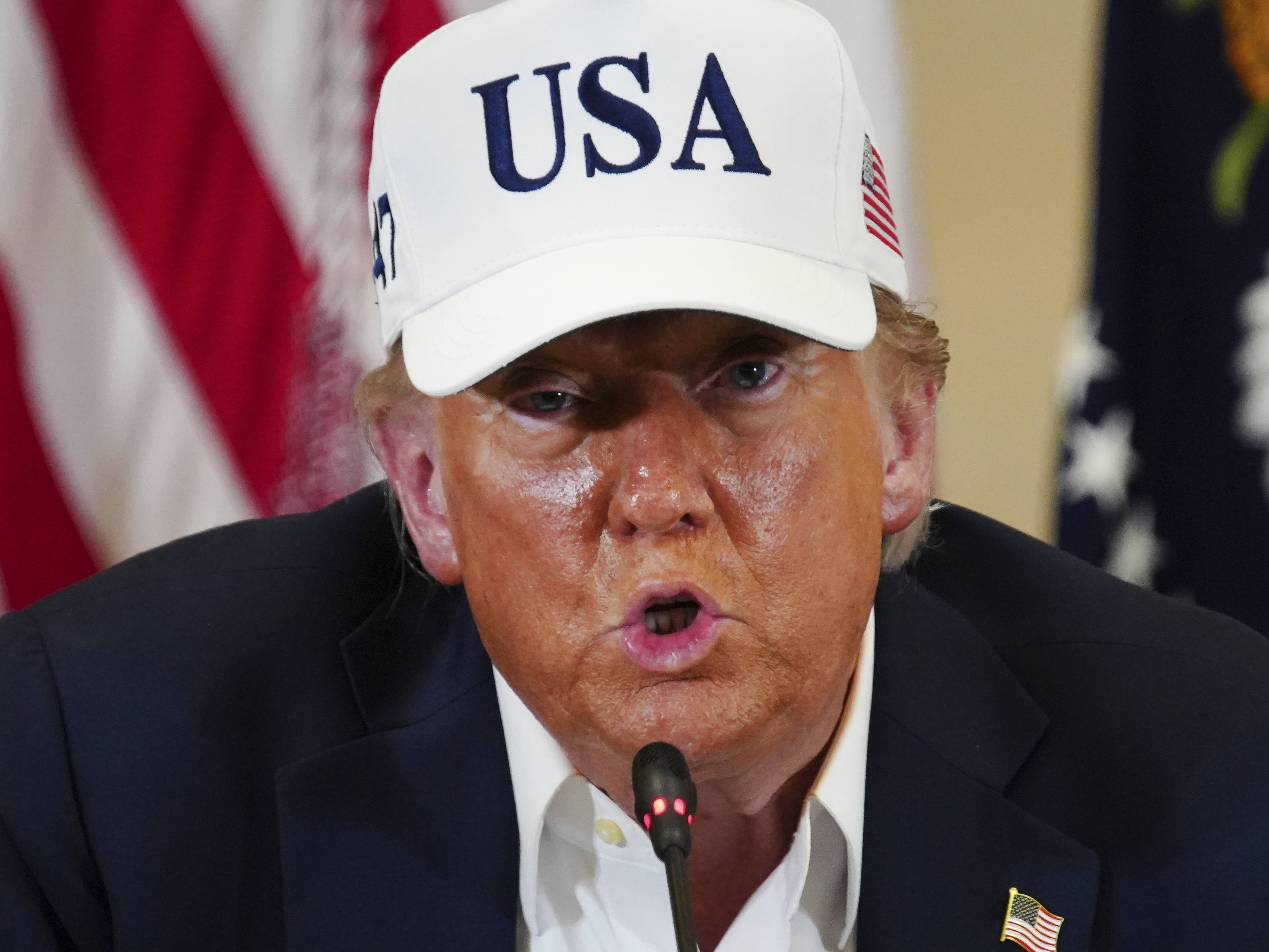 caption: President Donald J. Trump speaks at a roundtable discussion at the Community Emergency Operations Center in Kerrville, Texas, Friday, July 11, 2025.