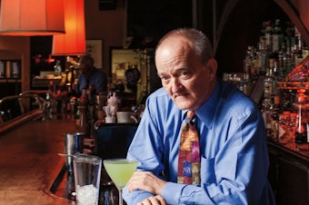 caption: Longtime Seattle bartender Murray Stenson at Queen City Grill in Belltown. 