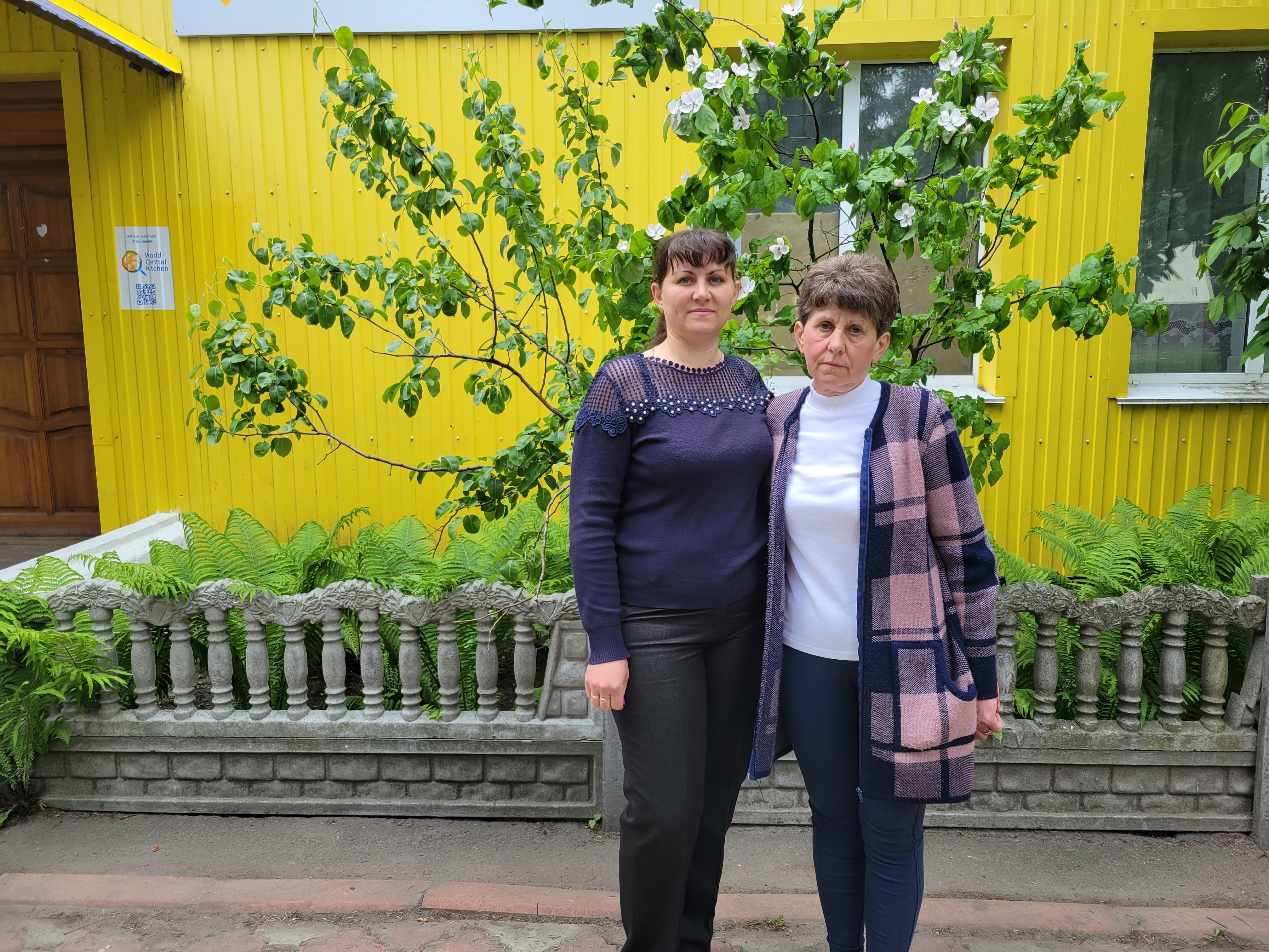 caption: Iryna Andrusha (left) and Kateryna Andrusha, sister and mother, respectively, of Ukrainian school teacher Viktoria Andrusha, who was taken by Russian forces from the village of Novyi Bykiv in late March.