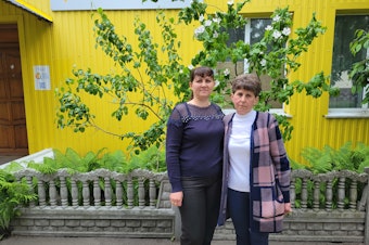 caption: Iryna Andrusha (left) and Kateryna Andrusha, sister and mother, respectively, of Ukrainian school teacher Viktoria Andrusha, who was taken by Russian forces from the village of Novyi Bykiv in late March.