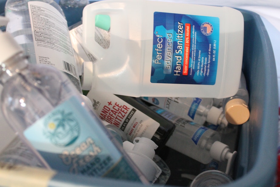 caption: Storage containers filled with donated hand sanitizer bottles are then distributed to protesters. Since the death of George Floyd at the hands of law enforcement, protests have been going on and off for about a month in Seattle. July 1, 2020. 