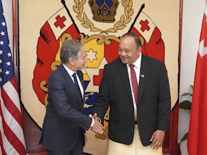 caption: U.S. Secretary of State Antony Blinken, left, shakes hands with Tonga's Prime Minister Tonga's Prime Minister Siaosi Sovaleni in Nuku'alofa, Tonga Wednesday, July 26, 2023.