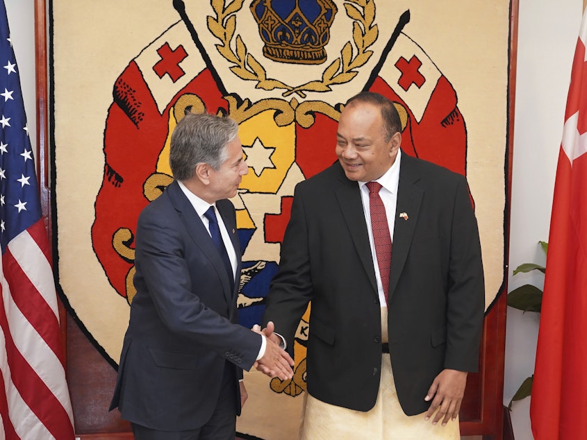 caption: U.S. Secretary of State Antony Blinken, left, shakes hands with Tonga's Prime Minister Tonga's Prime Minister Siaosi Sovaleni in Nuku'alofa, Tonga Wednesday, July 26, 2023.