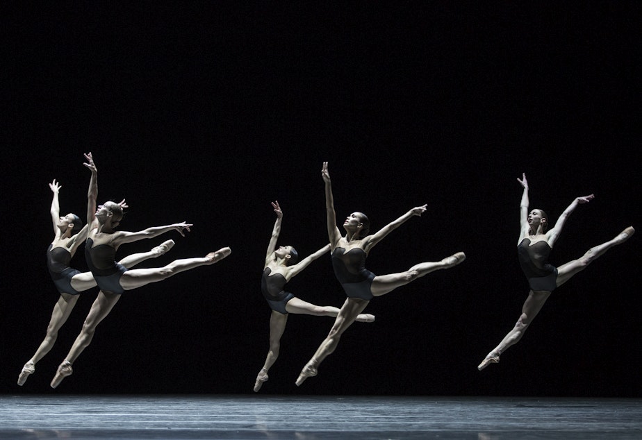caption: Pacific Northwest Ballet company members in a 2017 performance of David Dawson's "Empire Noire"