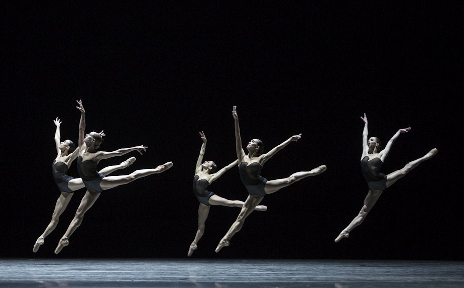 caption: Pacific Northwest Ballet company members in a 2017 performance of David Dawson's "Empire Noire"