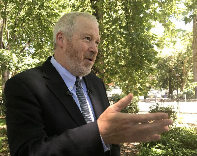 caption: On Wednesday at Denny Park, former Mayor Mike McGinn revealed a new tax plan in the Seattle mayor's race