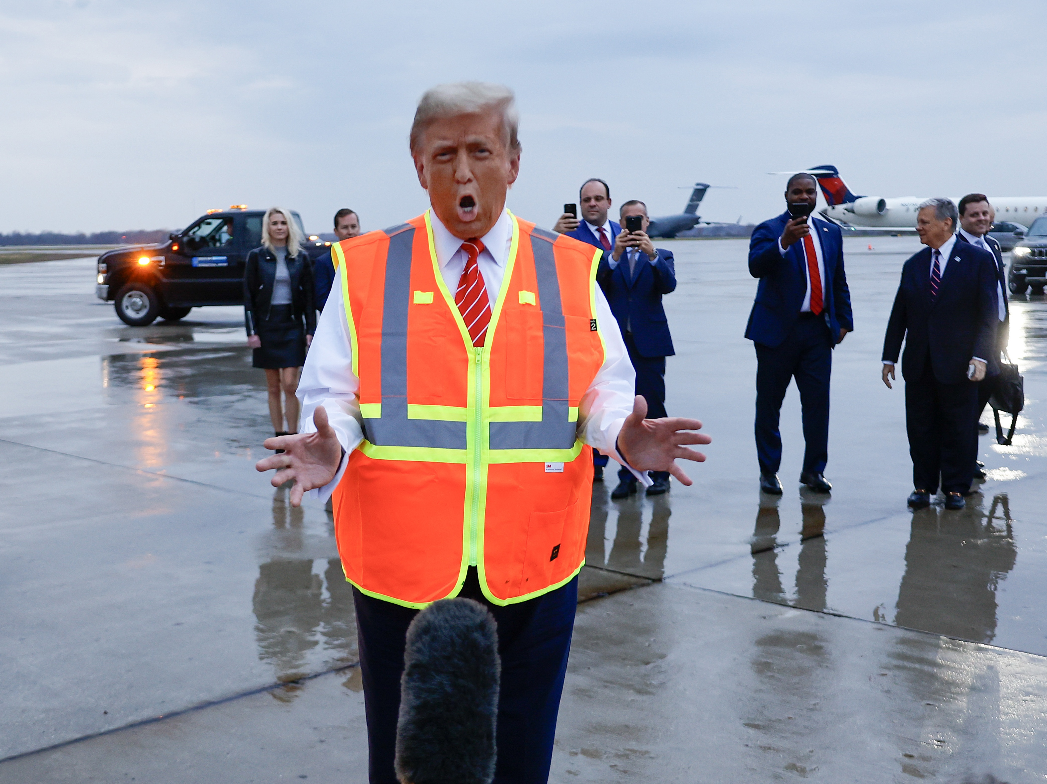 caption: Donald Trump speaks to the media at Green Bay Austin Straubel International Airport in Green Bay, Wisc., on Oct. 30, 2024.