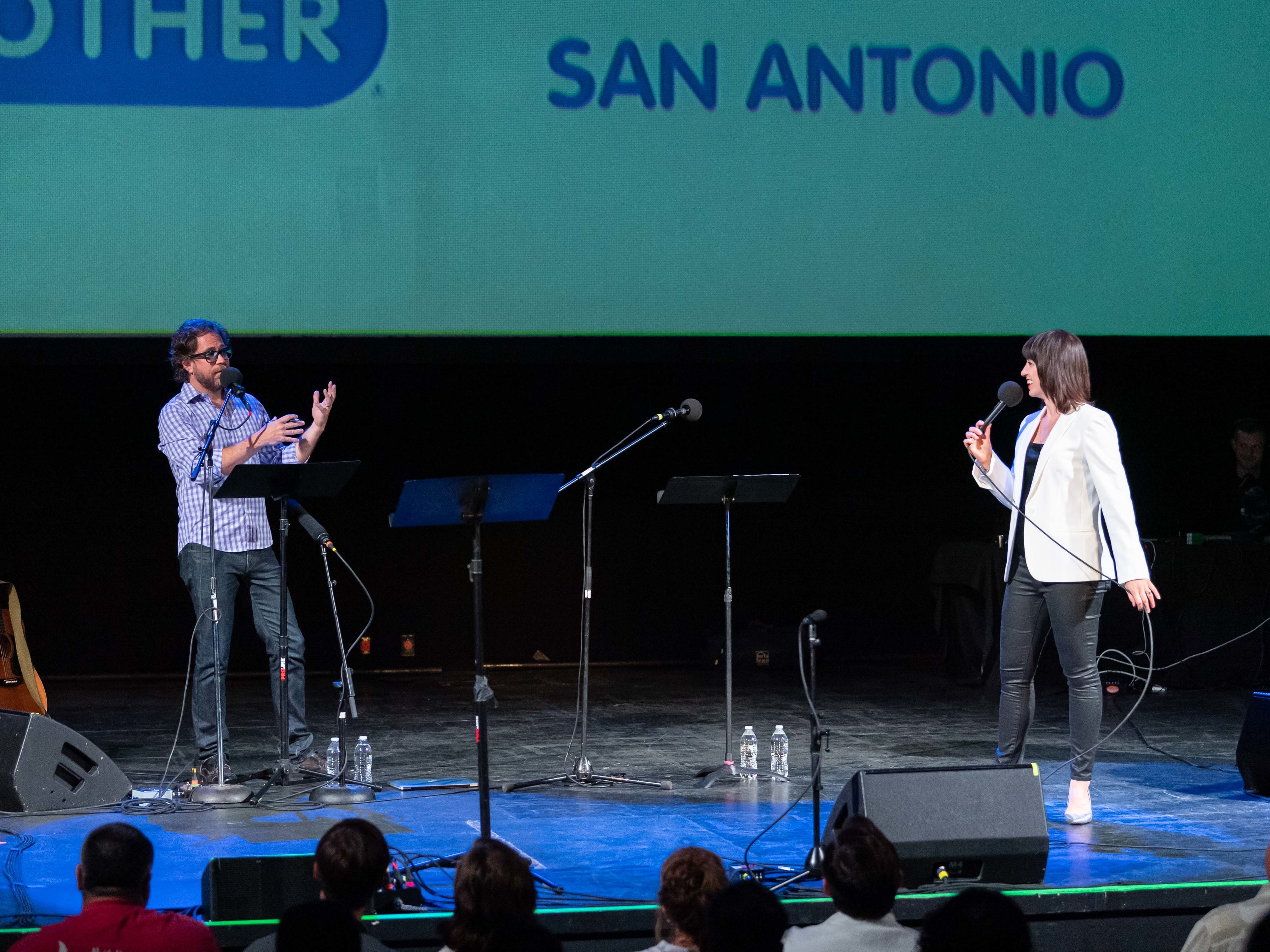 caption: <em>Ask Me Another'</em>s Jonathan Coulton and Ophira Eisenberg at the Aztec Theatre in San Antonio, Texas.
