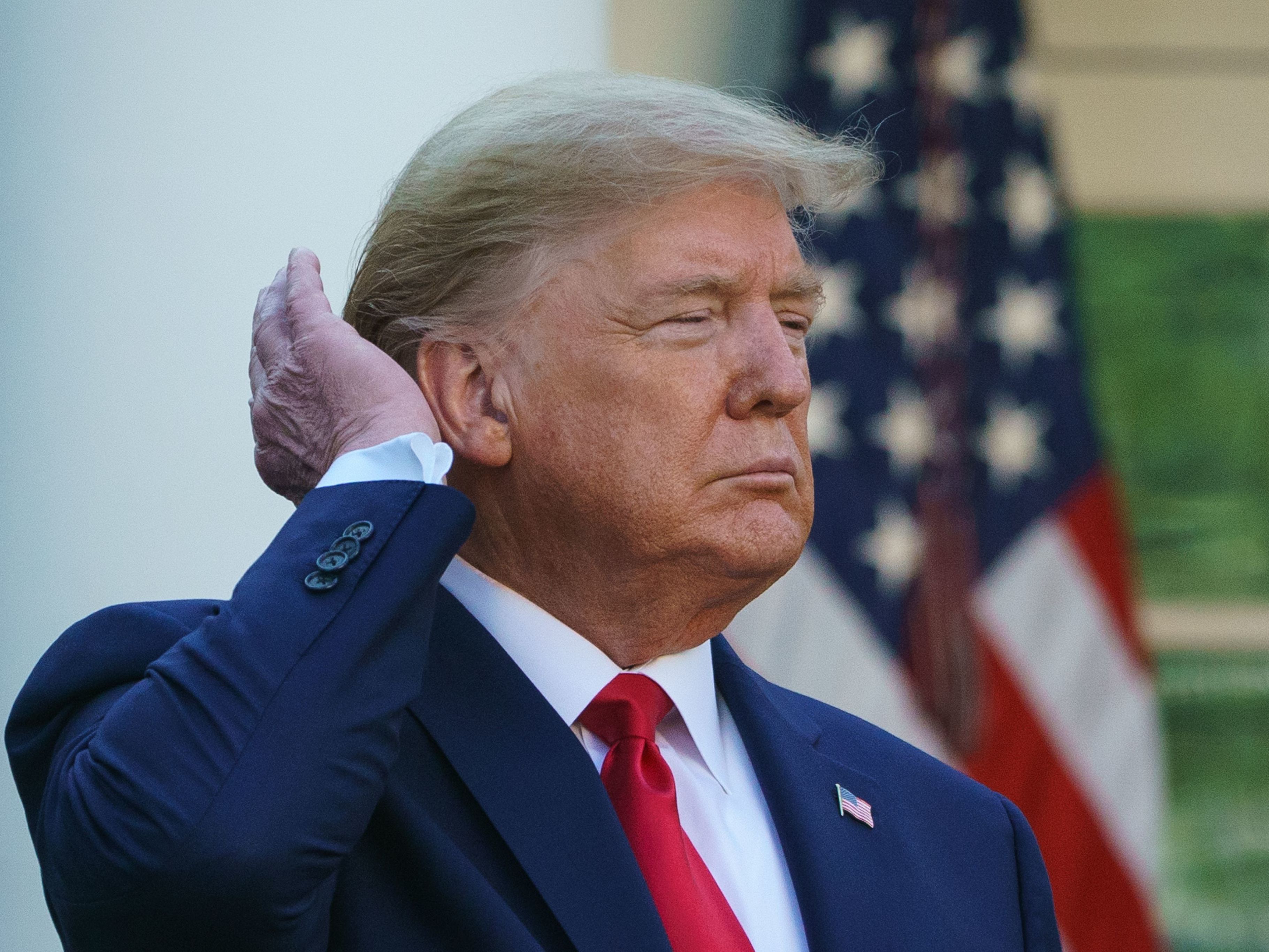 caption: President Trump has reportedly claimed tens of thousands of dollars in tax deductions over payments for items such as hair cuts. Trump is seen here during a briefing at the White House in March.
