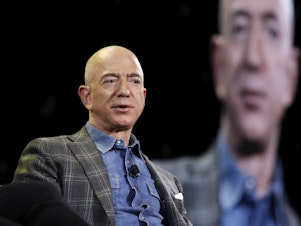 caption: FILE - Amazon CEO Jeff Bezos speaks at the Amazon re:MARS convention in Las Vegas on June 6, 2019. Bezos filed a statement with federal regulators indicating his sale of nearly 12 million shares of Amazon stock worth more than $2 billion on Feb. 7, 2024, and Feb. 8.