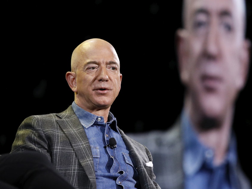 caption: FILE - Amazon CEO Jeff Bezos speaks at the Amazon re:MARS convention in Las Vegas on June 6, 2019. Bezos filed a statement with federal regulators indicating his sale of nearly 12 million shares of Amazon stock worth more than $2 billion on Feb. 7, 2024, and Feb. 8.