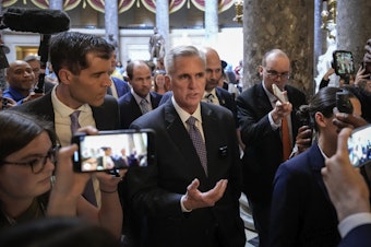 caption: Speaker of the House Kevin McCarthy talks to reporters as he walks to the House floor for a procedural vote ahead of the final vote for H.R. 3746 - Fiscal Responsibility Act of 2023 on May 31.