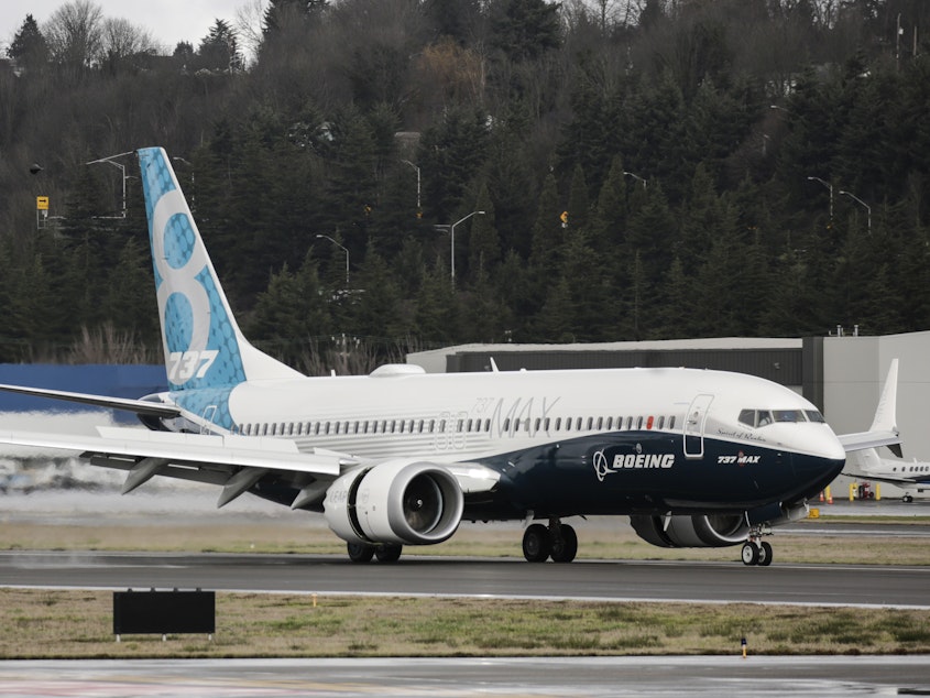 caption: A Boeing 737 Max 8 airliner lands at Boeing Field to complete its first flight on Jan. 29, 2016, in Seattle. The Boeing 737 Max is the fastest-selling plane in the company's history.