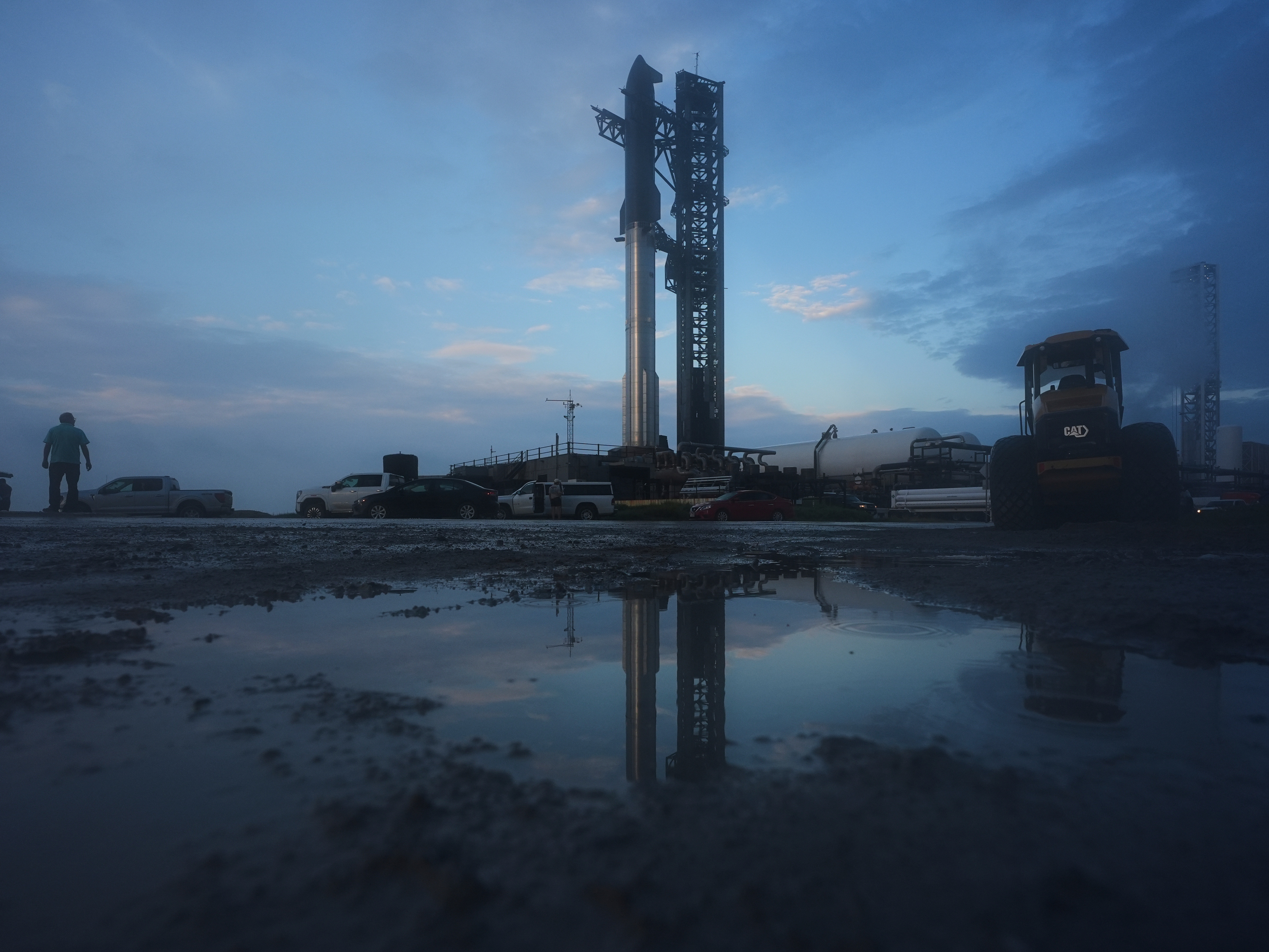 caption: SpaceX's mega rocket Starship is prepared for a test flight in Starbase, Texas, on Sunday.