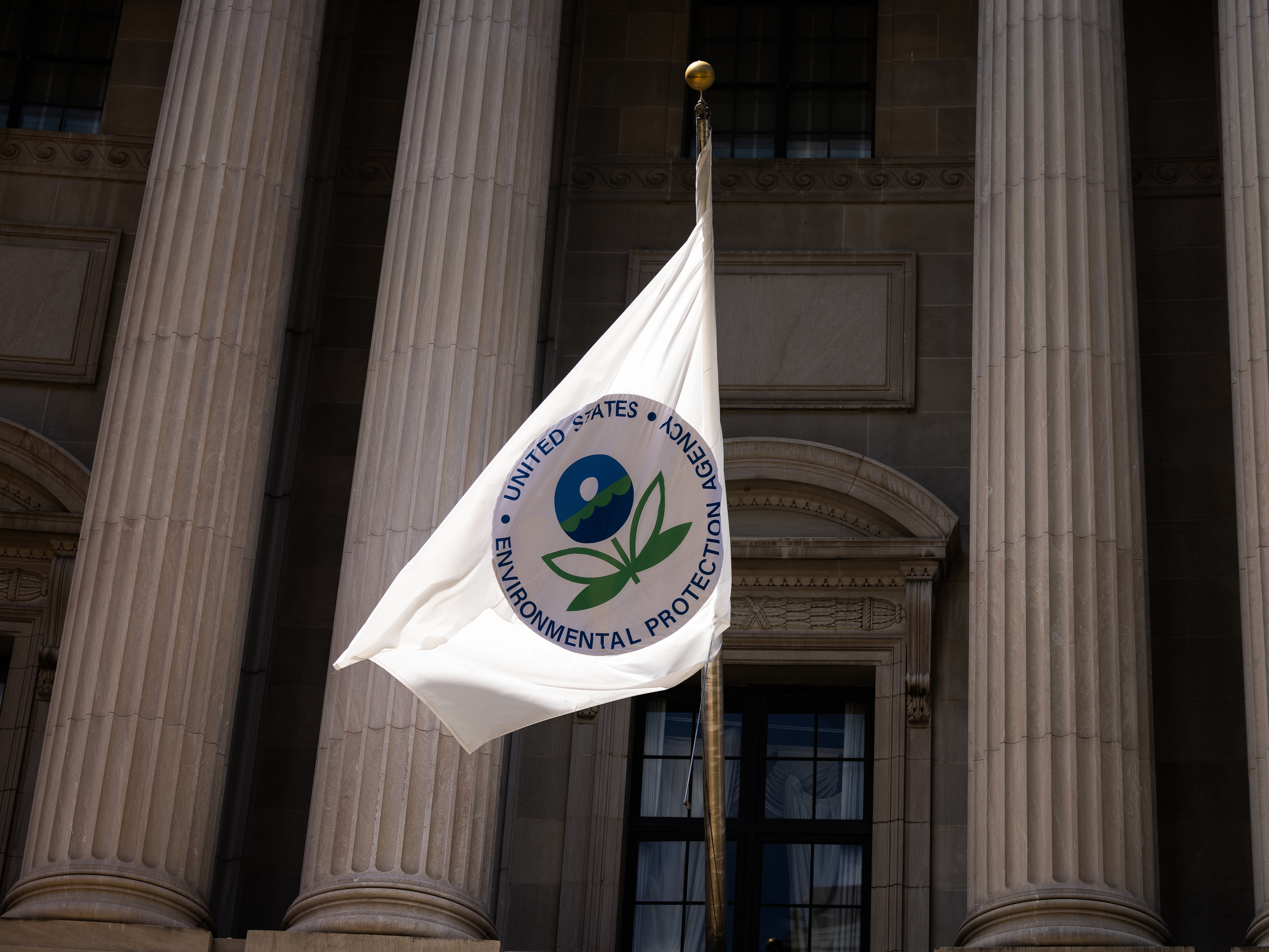 caption: The United States Environmental Protection Agency building is seen in August 2024 in Washington, D.C. The Trump administration is shutting down the agency's unit for scientific research.