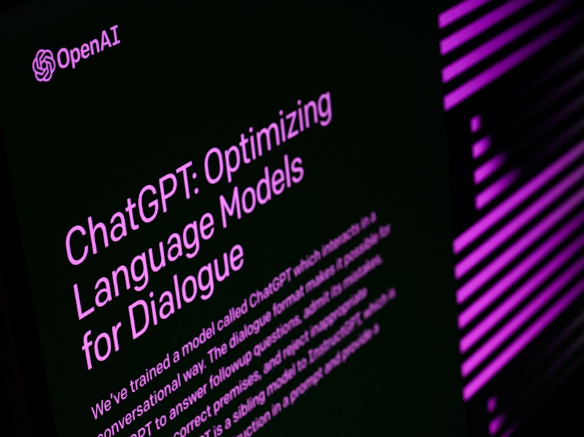 caption: The welcome screen for the OpenAI ChatGPT app is displayed on a laptop screen in February in London.