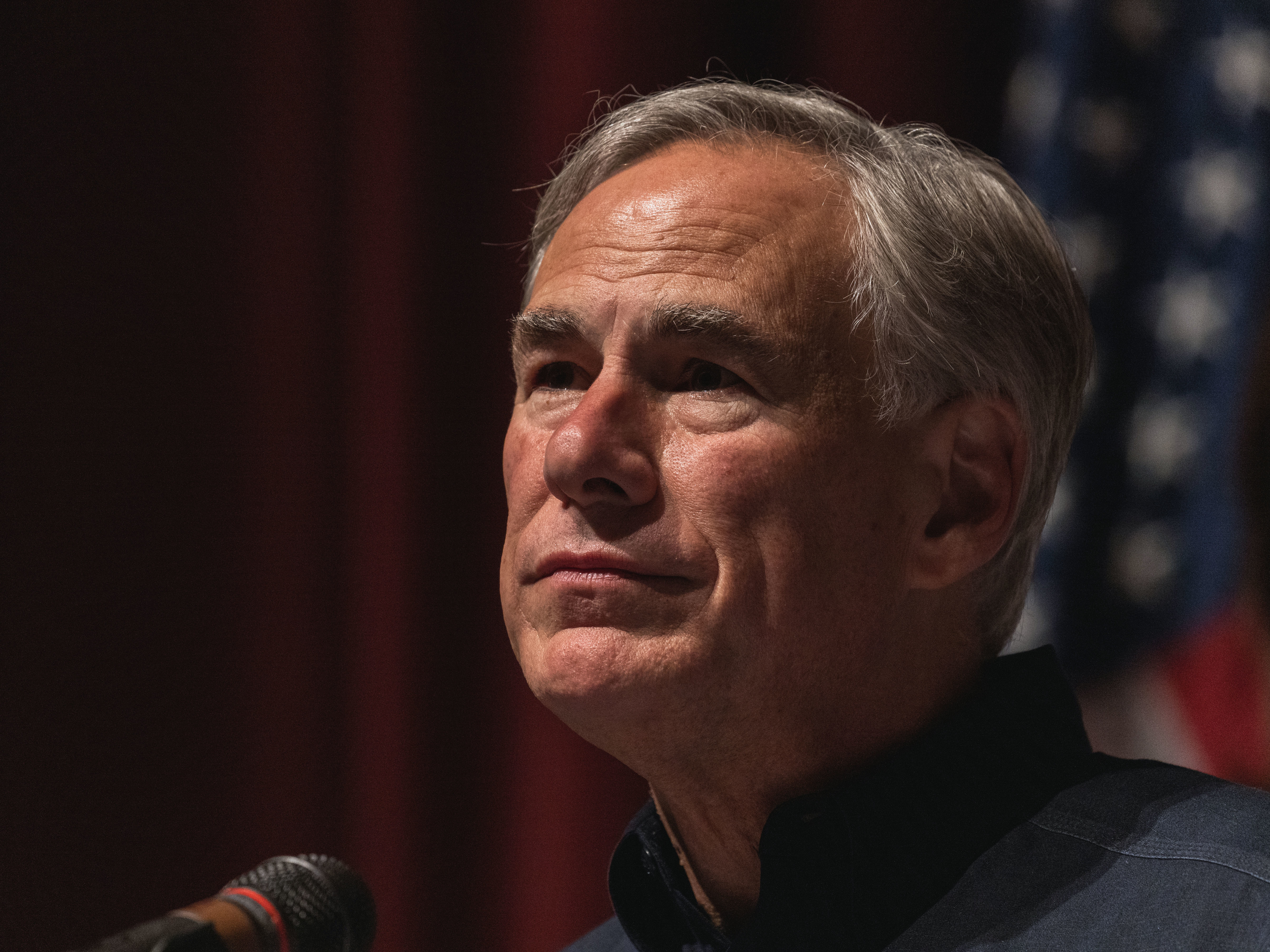 caption: Texas Gov. Greg Abbott speaks during a press conference on May 25 in Uvalde, Texas.