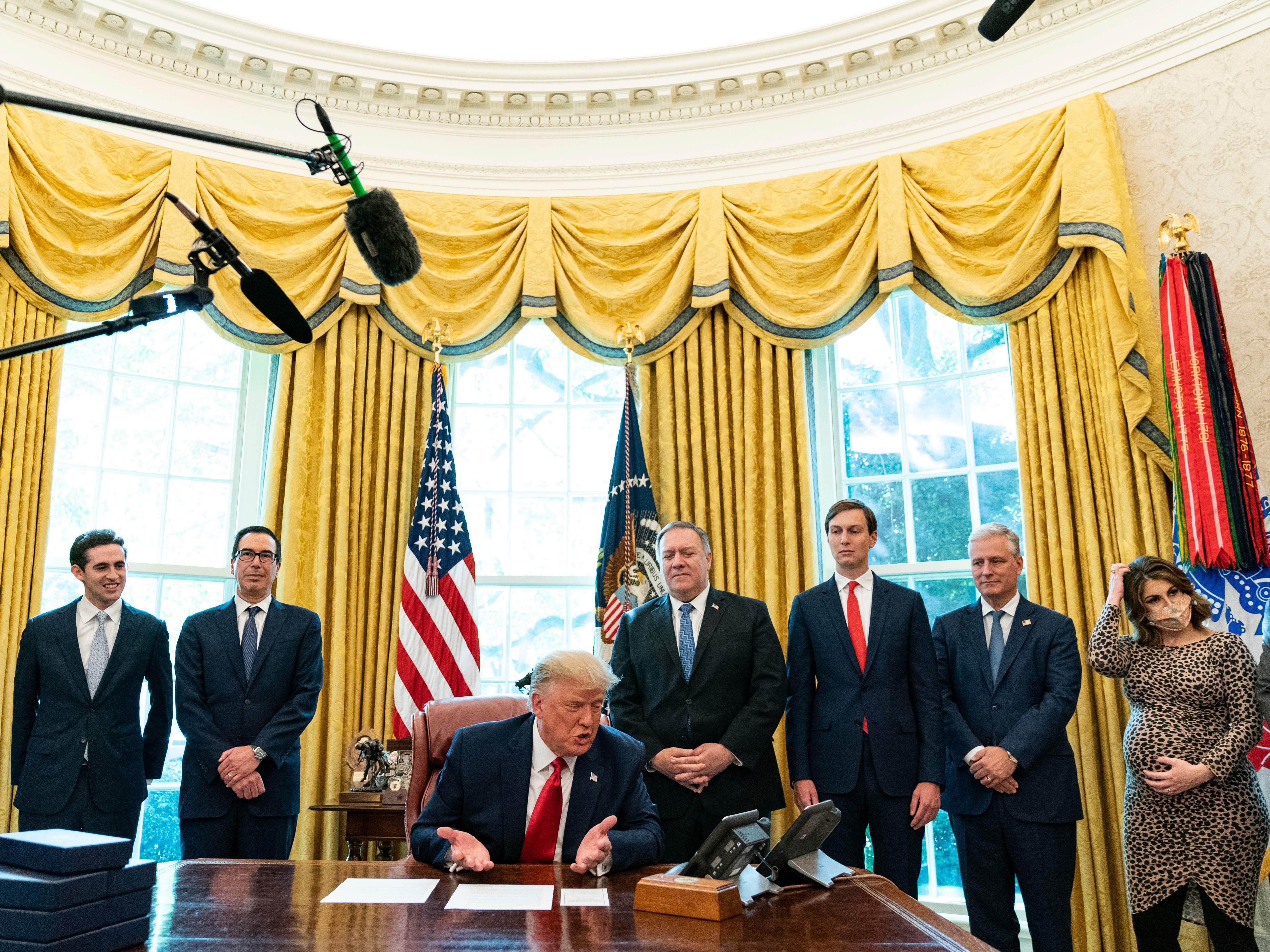 caption: President Trump speaks to the leaders of Sudan and Israel Friday as he announces Sudan will normalize relations with Israel at the White House. The U.S. is taking Sudan off its terrorism sponsor list and helping with Sudan's massive debt.
