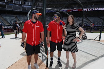 caption: Colorado Rockies television announcer Jenny Cavnar, right, jokes with Vinny Castilla, center, special assistant to the Rockies general manager, and Denver Broncos fullback Andy Janovich after they took part in the UC Healthy Swings Charity Home Run Derby Tuesday, June 11, 2019, in Coors Field in Denver.
