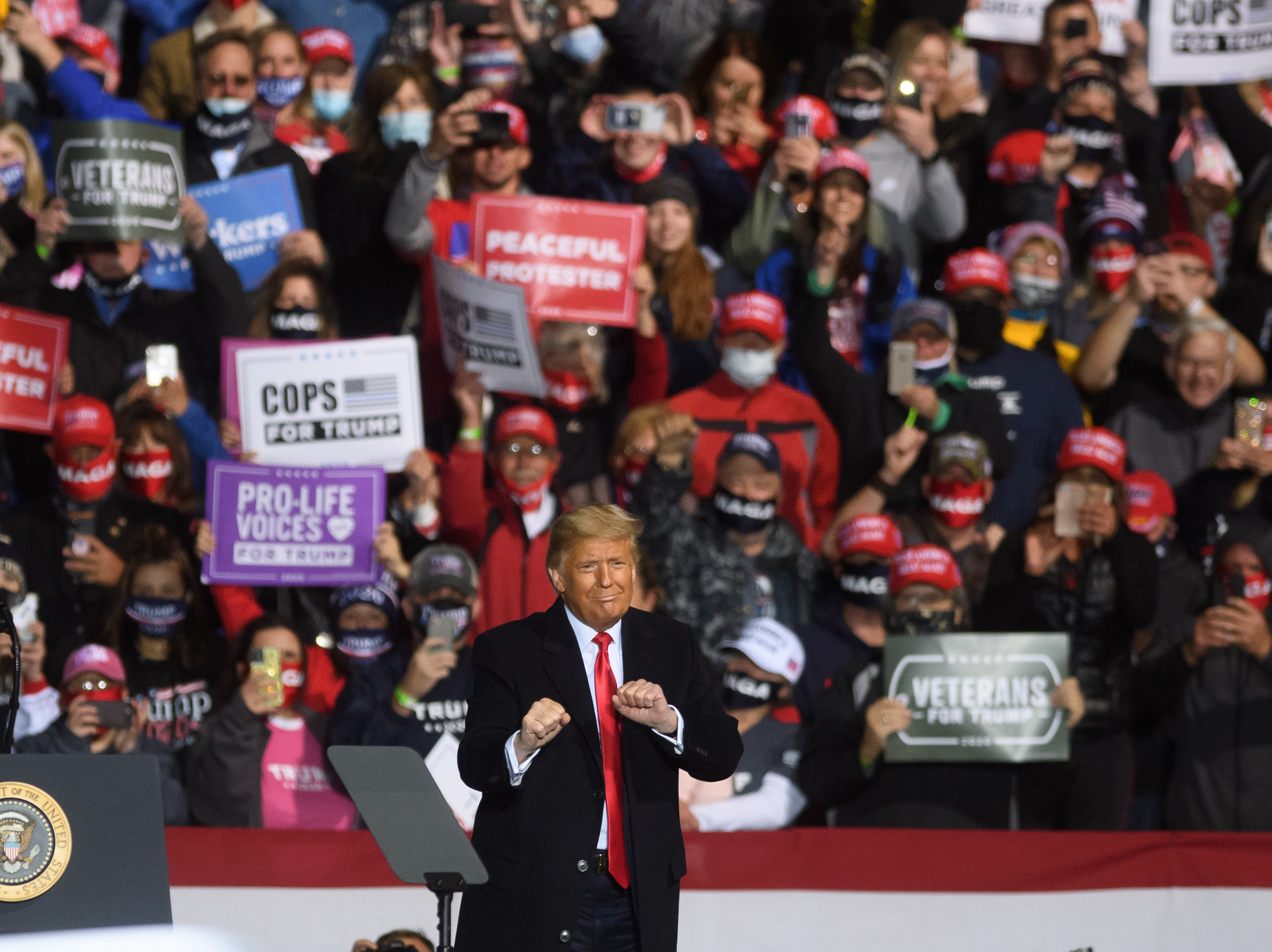 caption: President Trump dances after his hour-long speech to supporters at a rally in Johnstown, Pa., Tuesday evening.