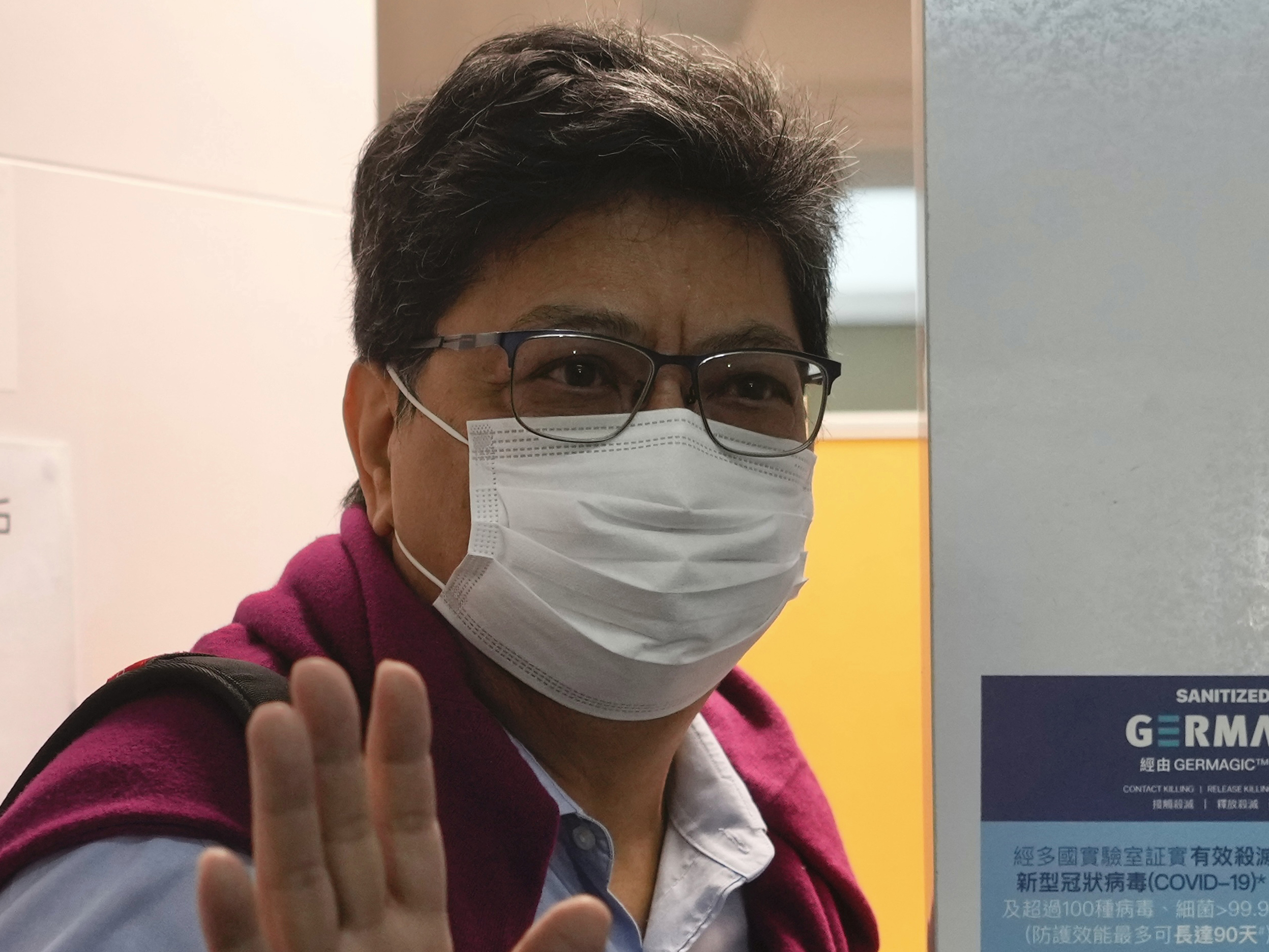 caption: Chris Yeung, founder and chief writer of Citizen News outside his office in Hong Kong Monday, Jan. 3, 2022. The online news site said Sunday that it would cease operations in light of deteriorating press freedoms.