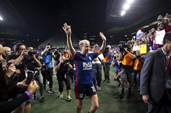 caption: OL Reign forward Megan Rapinoe leaves the field following her last regular-season NWSL home game against the Washington Spirit on Friday, Oct. 6, 2023, at Lumen Field in Seattle. 