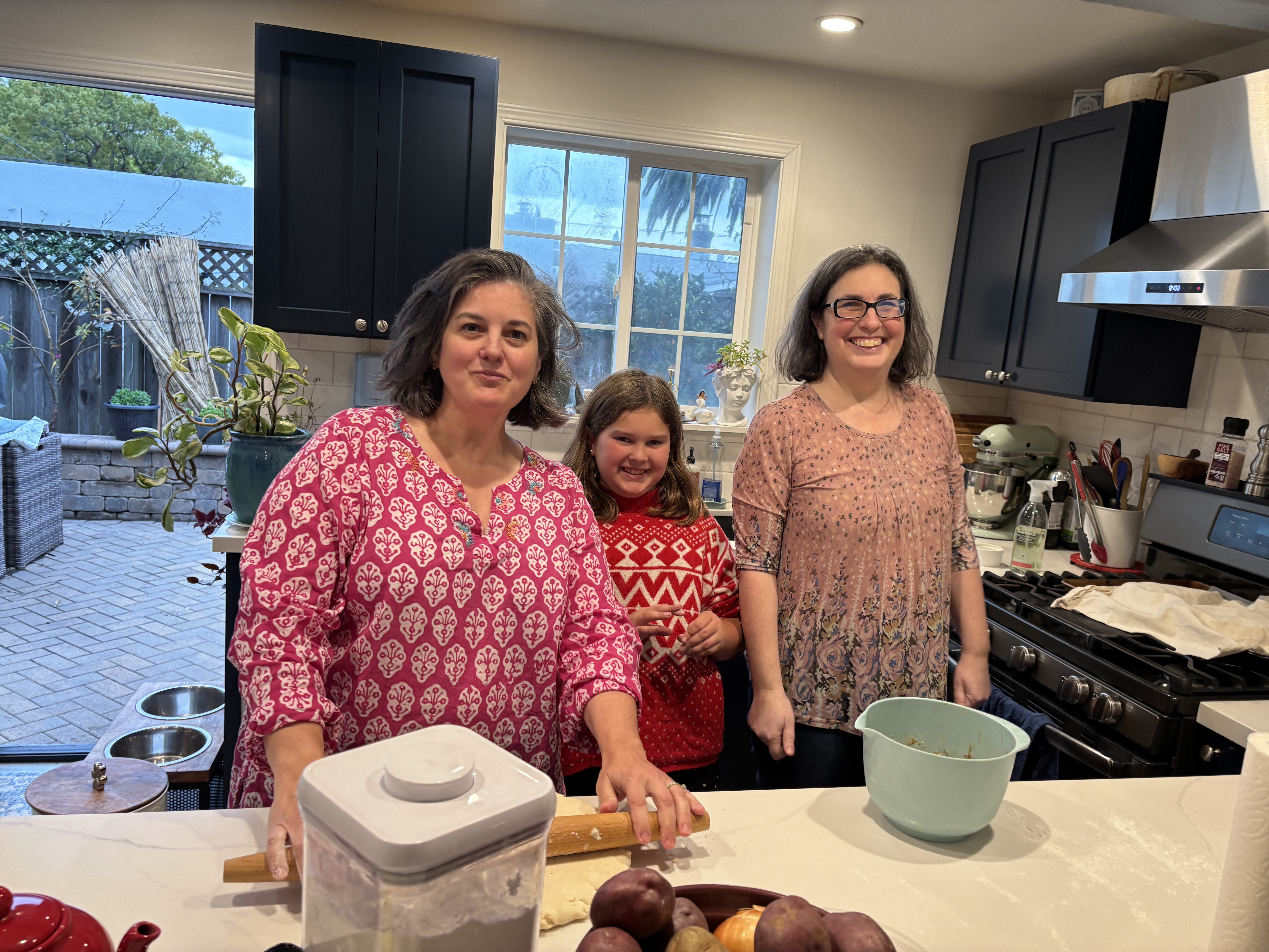 caption: The Weiss-Pires family — Lynda, Lillian and Bessie — enjoy baking Christmas and Hanukkah treats during the holiday season in their kitchen in Oakland, Calif.