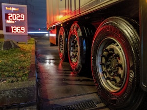 caption: Tires of a truck are pictured at a gas station in Frankfurt, Germany, Jan. 27. A European ban on imports of diesel fuel and other products made from crude oil in Russian refineries takes effect Feb. 5. The goal is to stop feeding Russia's war chest, but fuel costs have already jumped since the war started and they could rise again.