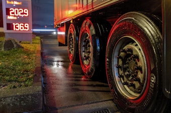 caption: Tires of a truck are pictured at a gas station in Frankfurt, Germany, Jan. 27. A European ban on imports of diesel fuel and other products made from crude oil in Russian refineries takes effect Feb. 5. The goal is to stop feeding Russia's war chest, but fuel costs have already jumped since the war started and they could rise again.