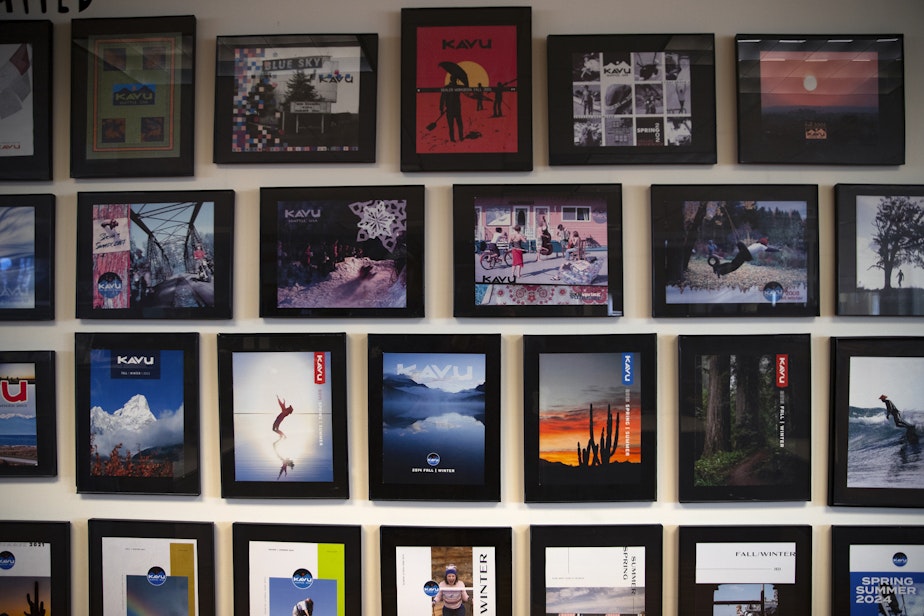 caption: A wall inside KAVU headquarters displays various catalog cover images, shown on Friday, Jan. 24, 2025, at KAVU headquarters in Seattle.