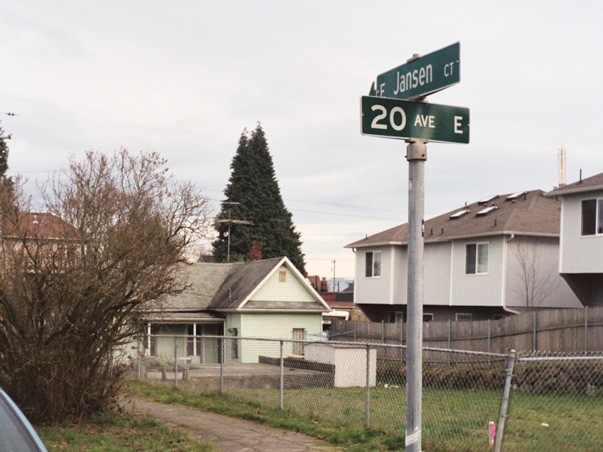 caption: J.D. was 15 when she was raped in a small white shed in the backyard at this intersection on Capitol Hill in Seattle in 2004.