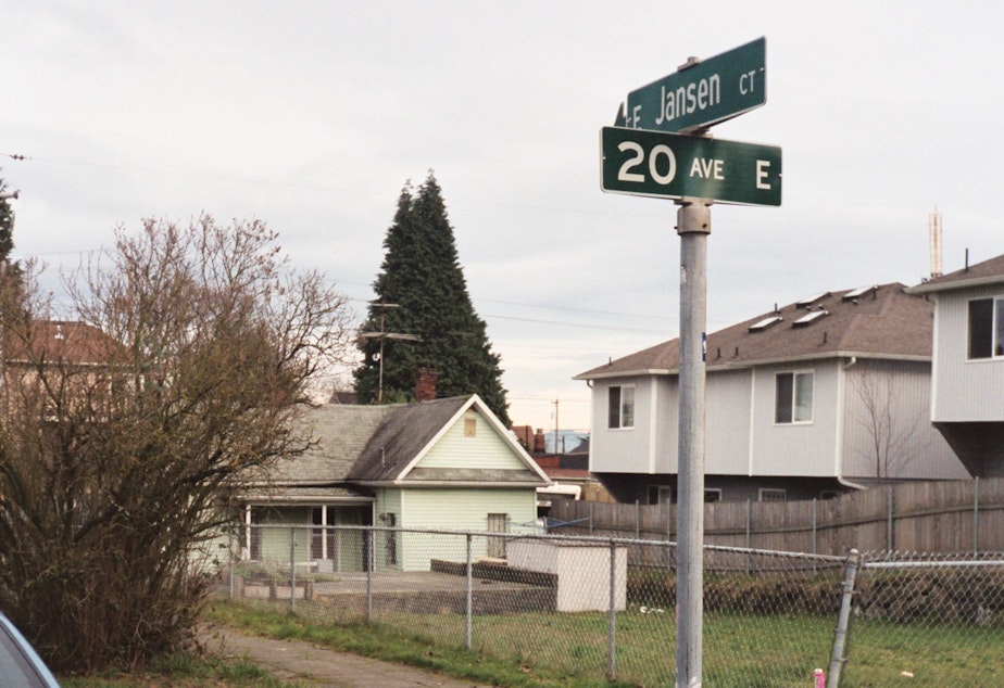 caption: J.D. was 15 when she was raped in a small white shed in the backyard at this intersection on Capitol Hill in Seattle in 2004.