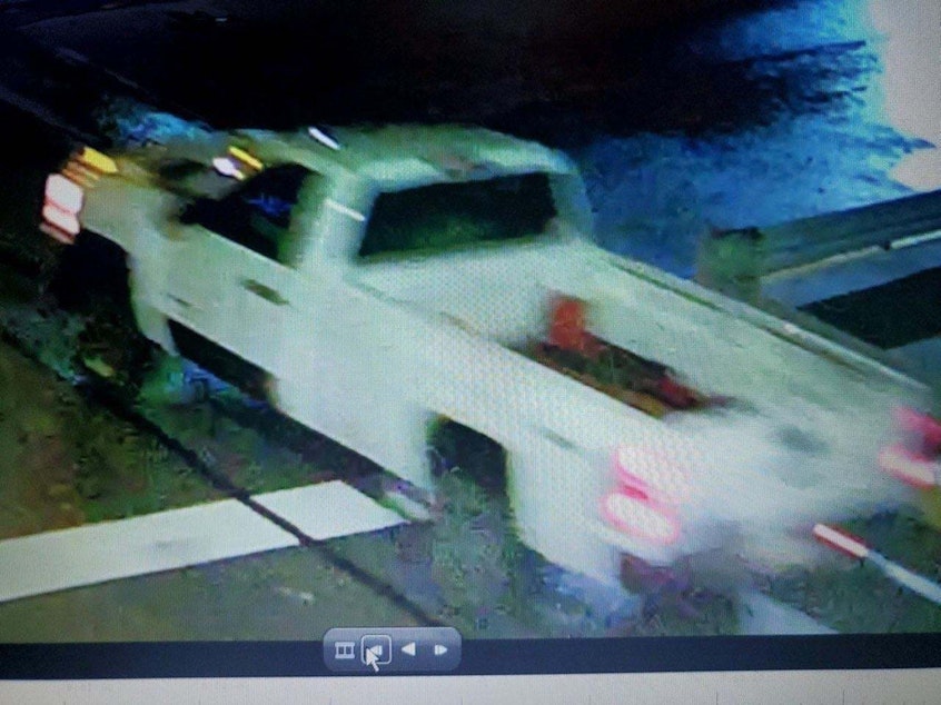 caption: Police are looking for a white truck in connection with an incendiary device thrown from a moving vehicle, which damaged a parked car Sunday night in Pittsburgh's Lawrenceville neighborhood.