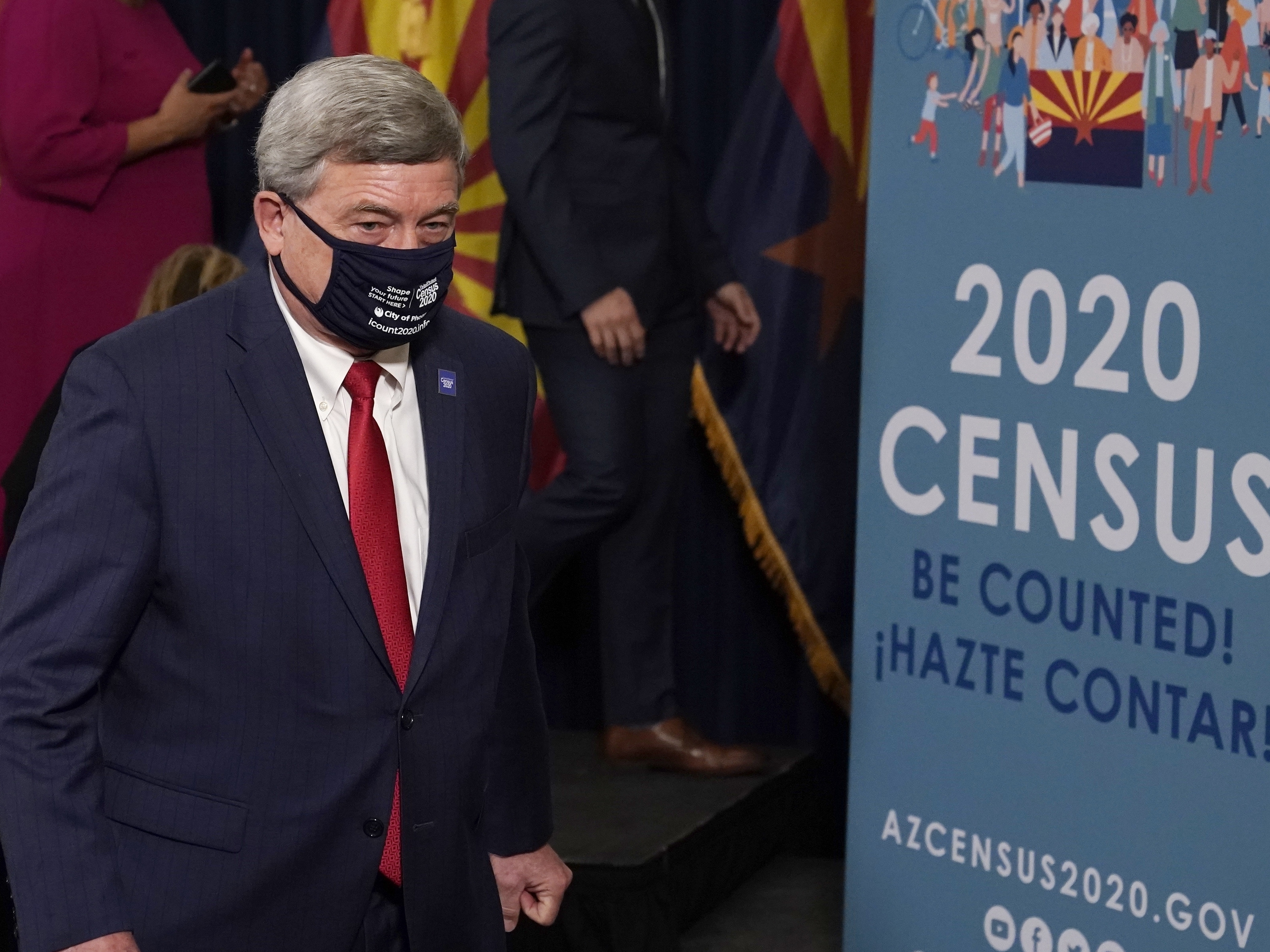 caption: U.S. Census Director Steven Dillingham departs a news conference about the 2020 census in Phoenix in September.