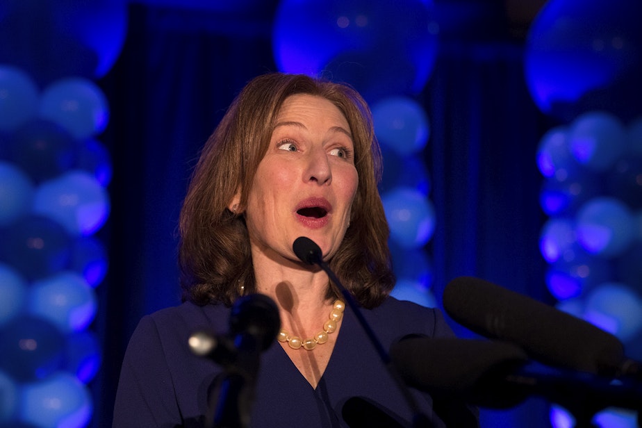 caption: Kim Schrier speaks to a large crowd on Tuesday, November 6, 2018, at the Hilton in Bellevue. 