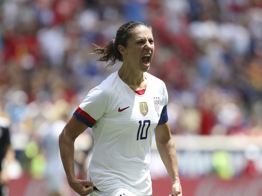 caption: The U.S. plays its first match of the 2019 FIFA Women's World Cup on Tuesday against Thailand in Reims, France. U.S. forward Carli Lloyd is seen here celebrating after scoring a goal against Mexico last month in Harrison, N.J.