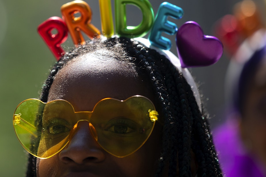 caption: Jada Boone, 11, with the Seattle Star Dance Troupe, marches during Seattle’s Pride Parade on Sunday, June 25, 2023, in downtown Seattle. 