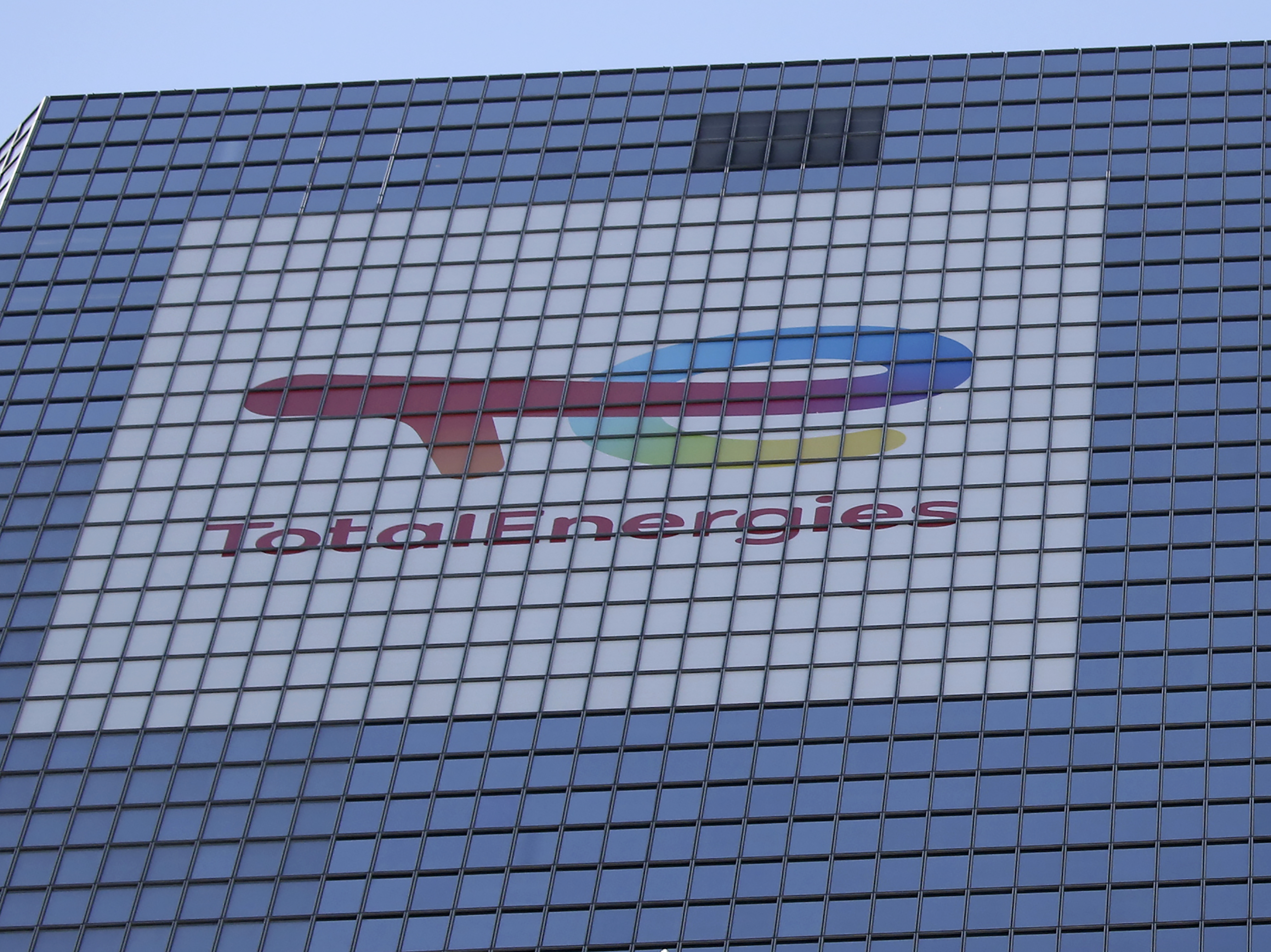 caption: The TotalEnergies tower outside Paris on Sept.7, 2021. The French energy conglomerate has asked the American and French governments to support targeted sanctions against Myanmar's oil and gas funds, one of the military government's primary sources of funding.