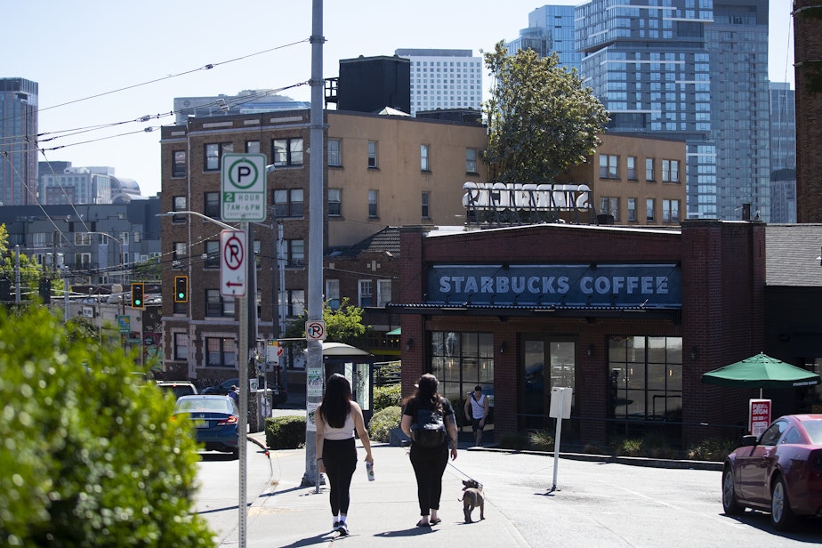 caption: A Starbucks location that was closed along East Olive Way is shown on Tuesday, July 12, 2022, in Seattle. 