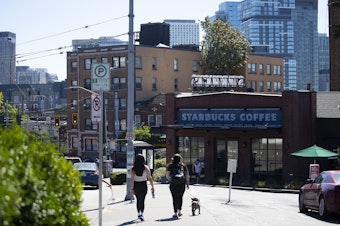 caption: A Starbucks location that was closed along East Olive Way is shown on Tuesday, July 12, 2022, in Seattle. 