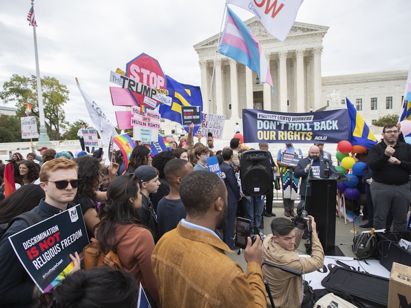 caption: LGBT supporters gather in front of the U.S. Supreme Court on Oct. 8, 2019.