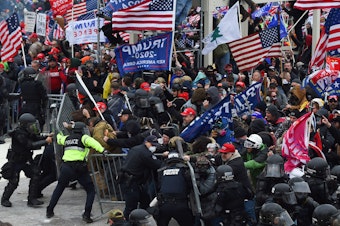 caption: Trump supporters clash with police and security forces during the insurrection at the Capitol on Jan. 6.