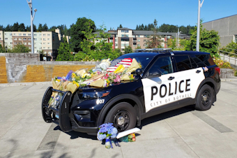 caption: Memorial emerges in Bothell where a police officer was shot and killed, and another was injured, July 14, 2020. 