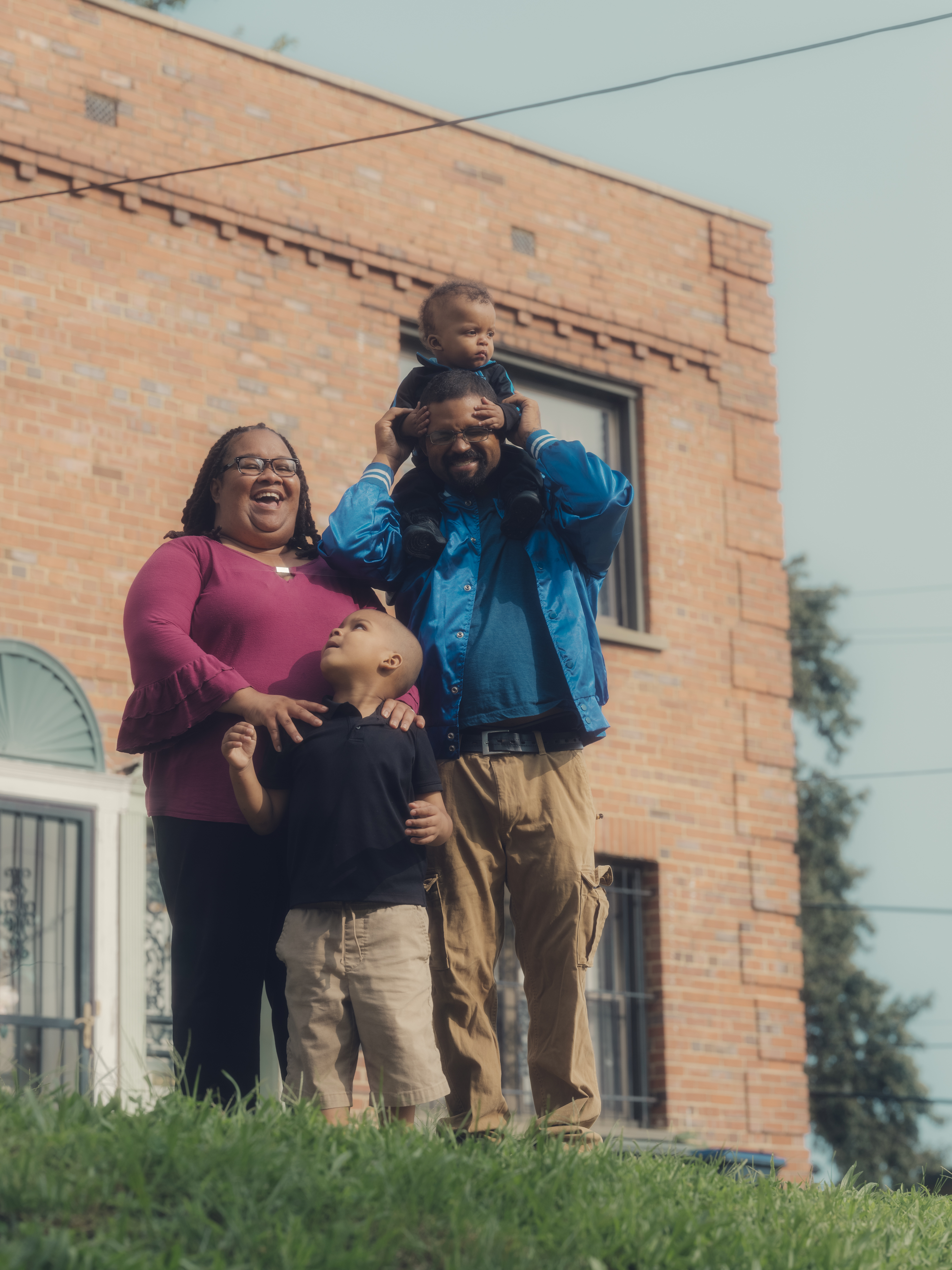caption: Stamper with her husband, Pete, and two sons at their home in Washington, D.C.