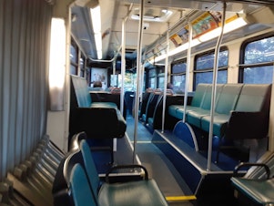 caption: A King County Metro bus in Seattle on Monday, March 16, 2020. The first weekday after Gov. Jay Inslee ordered no public gatherings more than 50 people, and also shut down restaurants and bars statewide in response to the COVID-19 outbreak. 