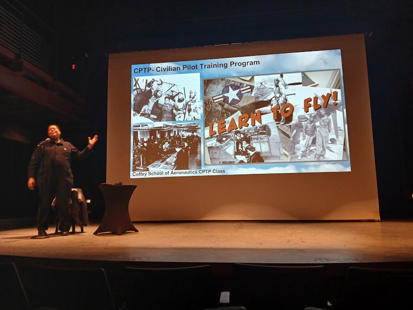 caption: Roz Cornejo (left) portrays Antoinette in Living Voices production "Fly For Freedom." The show highlights the experiences of Black women in aviation during World War II.