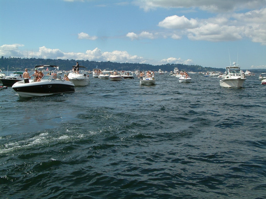 caption: Boats crowd Lake Washington during a past Seafair weekend.